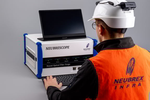 Worker Operates NEUBRESCOPE Device
